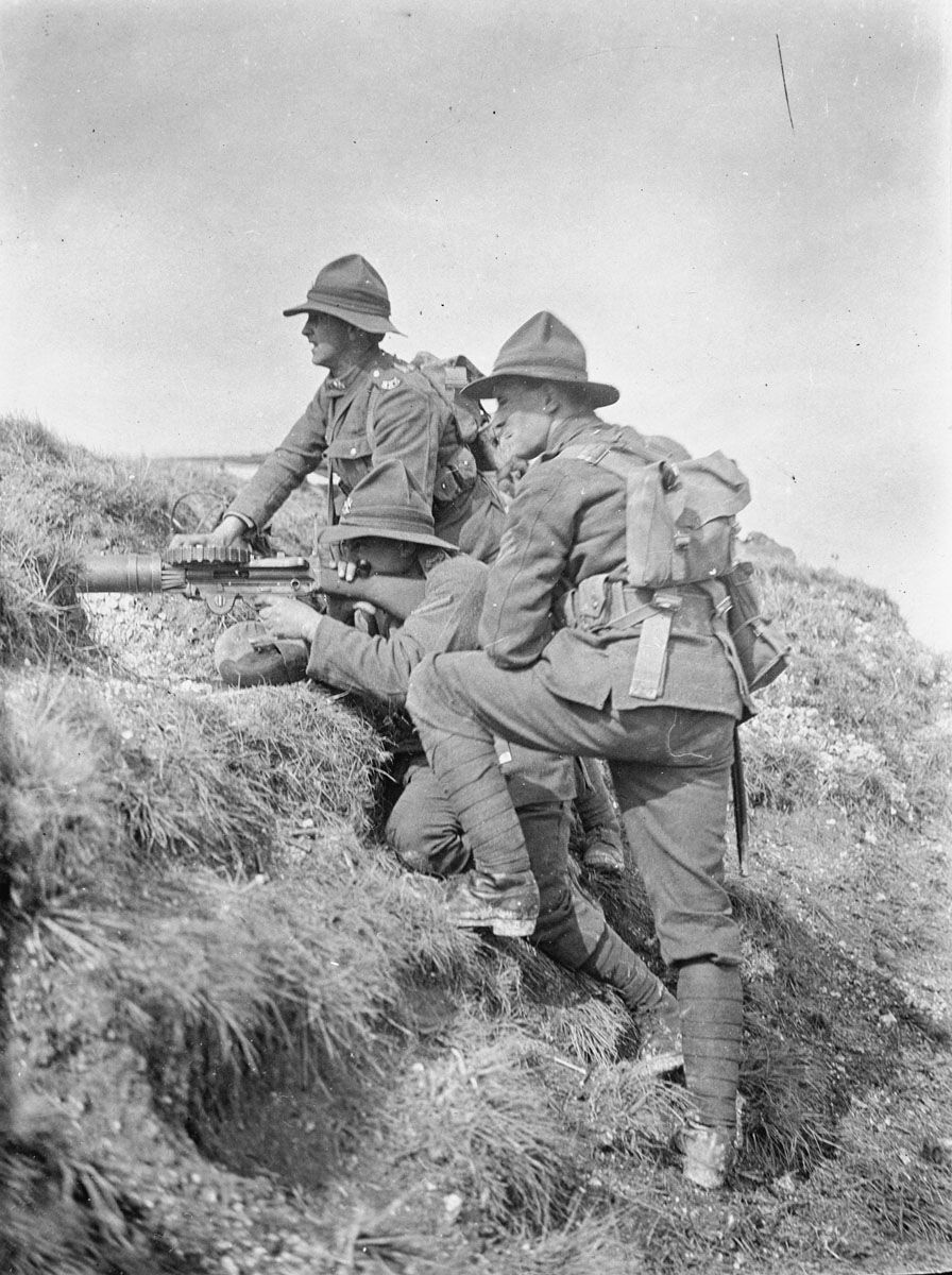 A New Zealand Lewis gun team in action on a mound. March 1918.